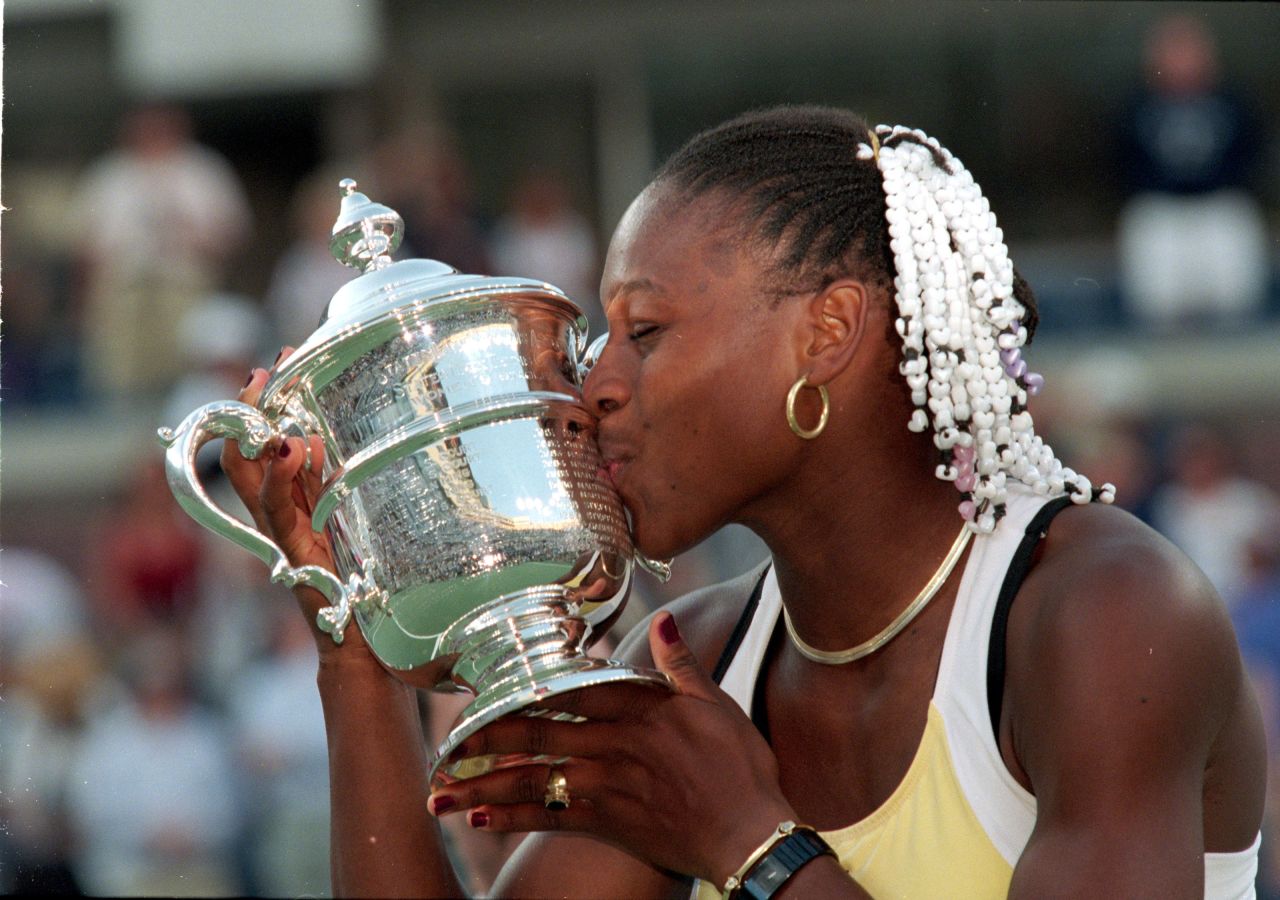 Serena sports a beaded hairstyle as she celebrates her first U.S. Open title -- and her first major -- back in 1999.