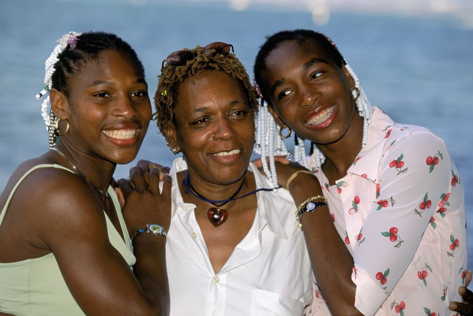 The Williams sisters pose for a photo with their mother, Oracene Price, in March 1999.