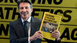 LONDON, ENGLAND - DECEMBER 03:  Lord Sebastian Coe poses with his IAAF Presidential Campaign Manifesto at the British Olympics Association offices on December 3, 2014 in London, England.  (Photo by Andrew Redington/Getty Images)