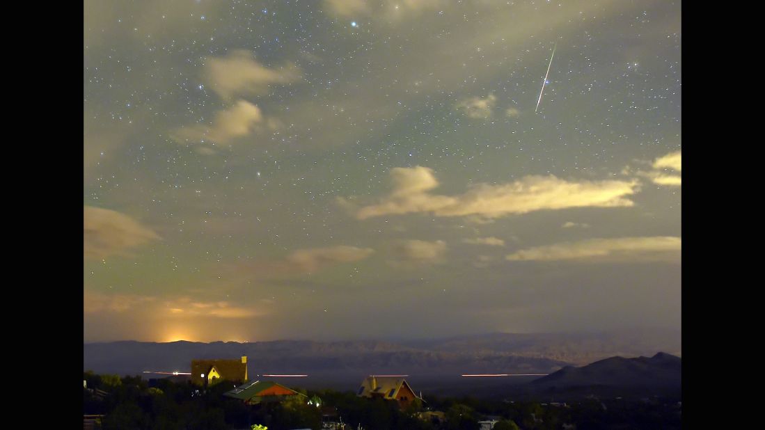  A Perseid meteor streaks across the sky over the Spring Mountains National Recreation Area in Nevada on August 12. 