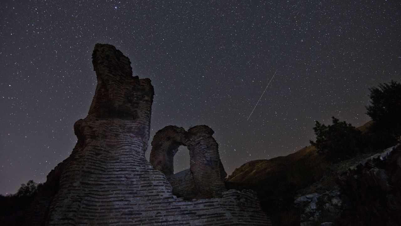 A long exposure image showing the Perseid meteor shower over the remains of an early Christian basilica in Bulgaria, early on August 12. 