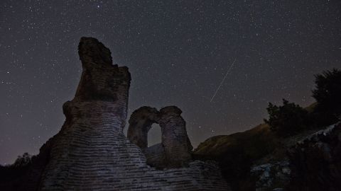 A long exposure image showing the Perseid meteor shower over the remains of an early Christian basilica in Bulgaria, early on August 12.