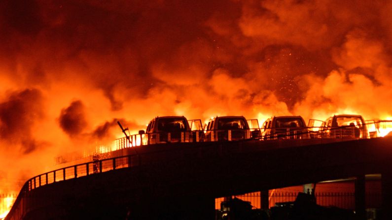 Fires continued to burn near the site of the explosions in the early hours of Thursday, August 13. 