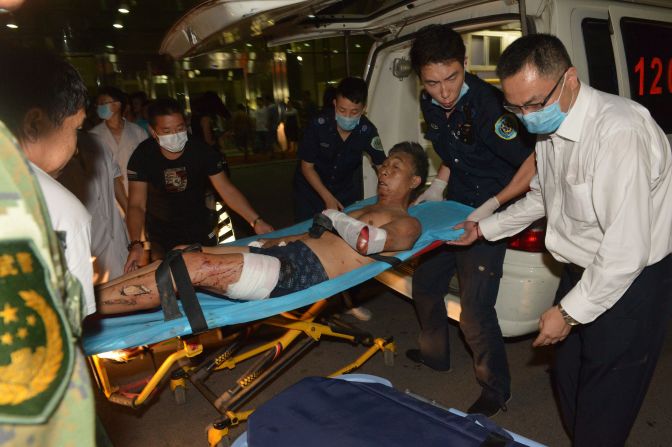 An injured survivor is brought to a hospital following the explosion.