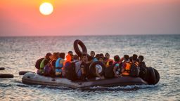 Migrants on a dinghy arrive at the island of Kos, Greece, after crossing from Turkey, on Thursday, August 13. Greece has become the main gateway to Europe for tens of thousands of refugees and economic migrants, mainly Syrians fleeing war, as fighting in Libya has made the alternative route from north Africa to Italy increasingly dangerous.