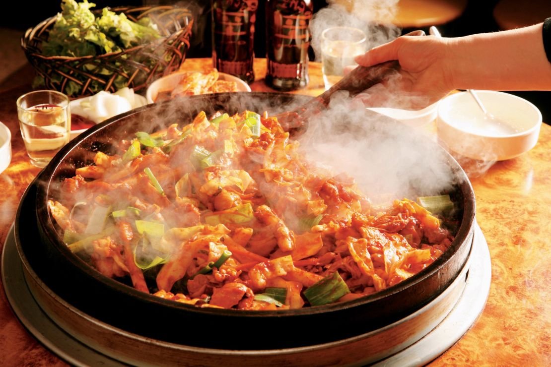 Which gochujang-covered chunk is chicken? And which is cabbage? Doesn't matter, it's all dakgalbi now.