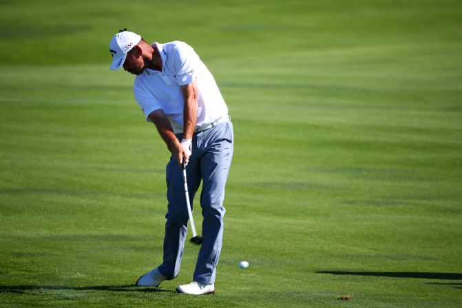 Denmark's Thomas Bjorn started the day strongly and was joint leader with Johnson for a stage before fading.