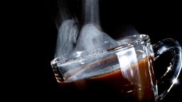 (GERMANY OUT) Coffee, glass cup, cup, smoke, black background,  (Photo by Stanzel/ullstein bild via Getty Images)
