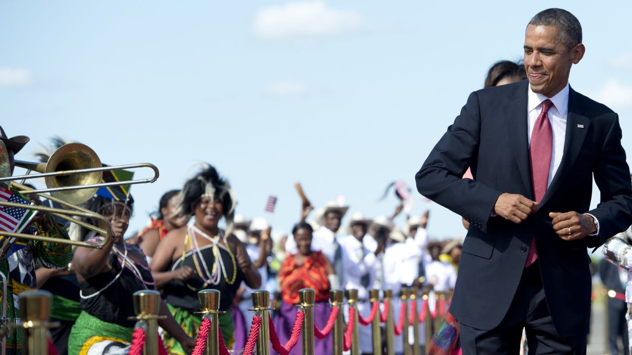 President Obama dances upon arrival in Dar Es Salaam, Tanzania, in 2013.