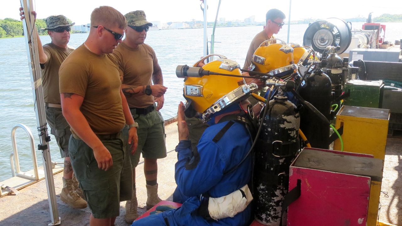 Two divers are sent to the bottom at a time, for a dive that often lasts more than an hour. A third diver is on standby, in case there is a medical or other serious problem.