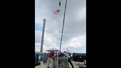 Artifacts from the Civil War vessel CSS Georgia are moved for further inspection and protection.