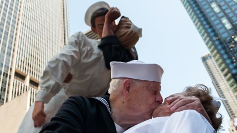 NEW YORK, AUGUST 14: World War II veterans Ray and Ellie Williams recreate the iconic Alfred Eisenstaedt photograph in Times Square. The Williams, Navy veterans also celebrating their 70th wedding anniversary, participated in a re-enactment of the famous photo. (Photo by Bryan Thomas/Getty Images)