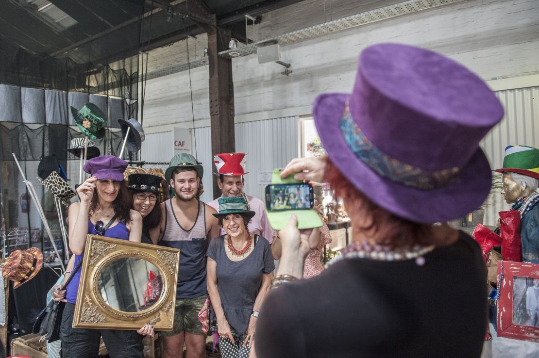 Market goers pose for a photo at Arts on Main in the Maboneng.