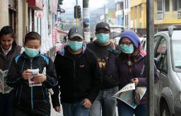 Residents of Machachi, Ecuador wear masks Friday afternoon.