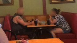 Photo from Lisa Loeffelholz captures couple with snake in Nixa, Missouri restaurant