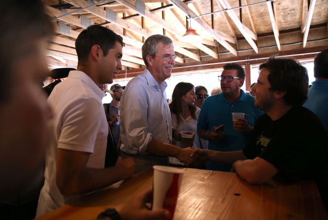 Bush meets fairgoers on August 14.