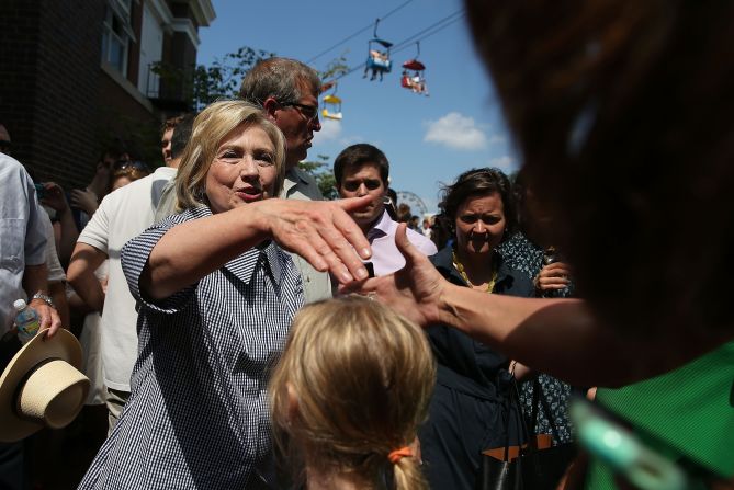 Clinton greets fairgoers on August 15.