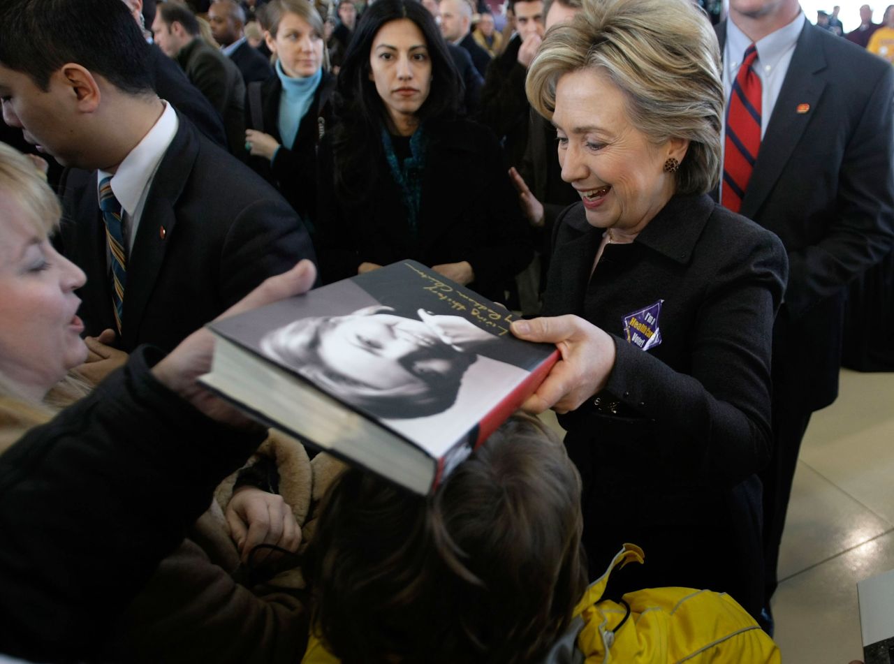 Clinton (right) greets people during a campaign stop at Aeroservices, Inc. on January 4, 2008 in Nashua, New Hampshire, accompanied by Abedin.