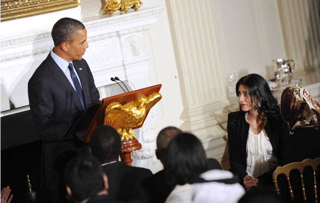 U.S. President Barack Obama acknowledges Abedin at an Iftar dinner celebrating Ramadan in the State Dining Room of the White House August 10, 2012 in Washington. 