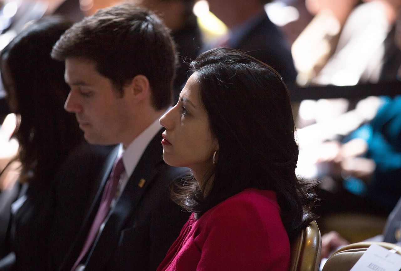 Abedin watches as Democratic presidential hopeful Hillary Clinton speaks during the David N. Dinkins Leadership and Public Policy Forum at Columbia University on April 29 in New York City.