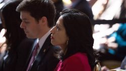 Clinton aide Huma Abedin watched as democratic presidential hopeful and former Secretary of State Hillary Clinton speaks during the David N. Dinkins Leadership and Public Policy Forum at Columbia University April 29, 2015 in New York City. Clinton addressed the unrest in Baltimore and called for police body cameras and a reform to sentencing.