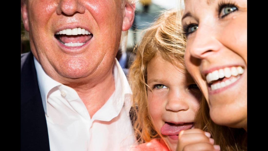 Republican presidential candidate Donald Trump poses for a picture with a woman and child at the 2015 Iowa State Fair in Des Moines on Saturday, August 15. Presidential candidates of every stripe were at the fair this weekend, mingling with voters in the first-in-the-nation caucus state, taking questions on the Des Moines Register Soapbox and, of course, chowing down on some deep-fried food. Photographer Landon Nordeman traversed the fair in search of presidential candidates and interesting people. These are his photographs from the first three days of the event.