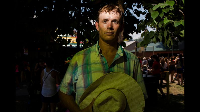 Ty Redman, 28, a farmer from Leon, Iowa, attends the fair. He has yet to decide whom he will vote for in the upcoming election.