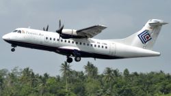 This is a file photo of a Trigana Air Service's ATR42-300 twin turboprop plane. The same type of a Trigana airliner carrying 54 people was missing Sunday, Aug. 16 after losing contact with ground control during a short flight in bad weather in the country's mountainous easternmost province of Papua, officials said. A search for the plane was suspended and will resume Monday morning. 