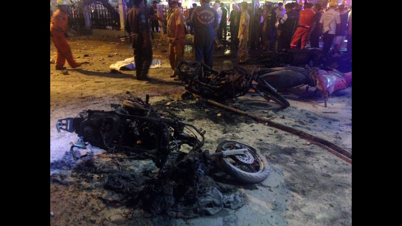 Destroyed motorcycles lie among debris after a blast near a popular Hindu shrine in Bangkok on August 17.