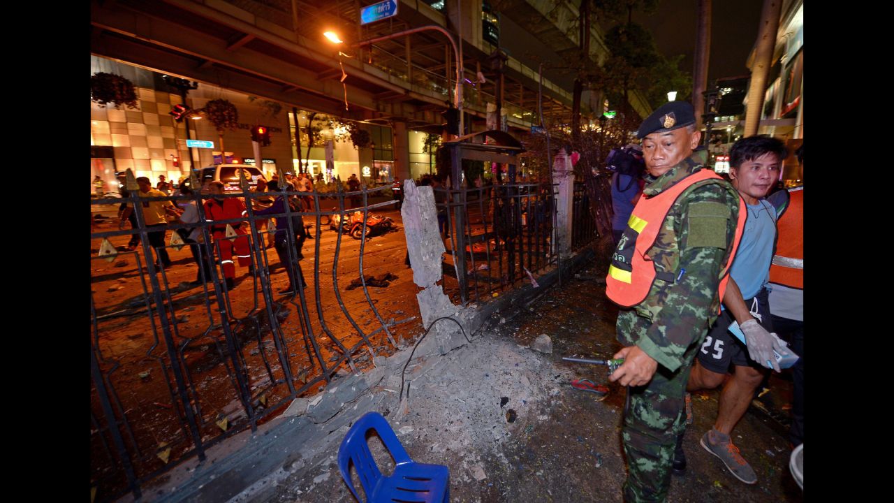 A Thai soldier stands guard at the scene of the blast.