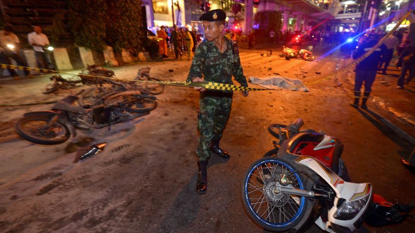 A Thai soldier ropes off the scene of the bombing.