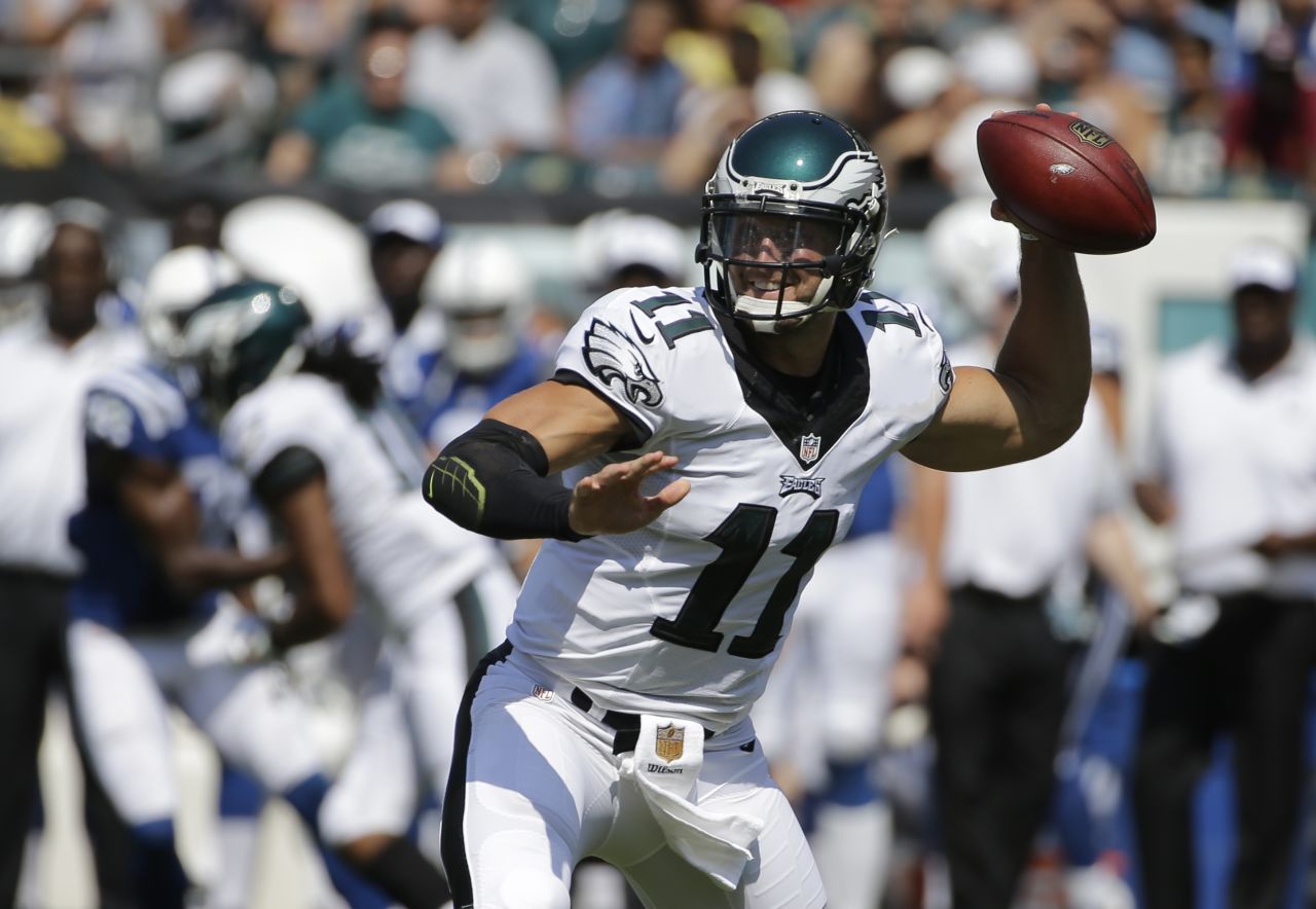 Tebow throws a pass for the Philadelphia Eagles during a 2015 preseason game. The team released him later that year. The Eagles were the fourth NFL team for Tebow.