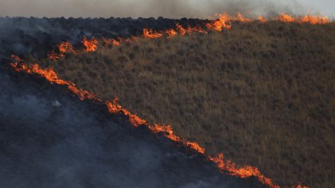 A burn operation is seen during the Jerusalem Fire, near Lower Lake, California, on Friday, August 11.