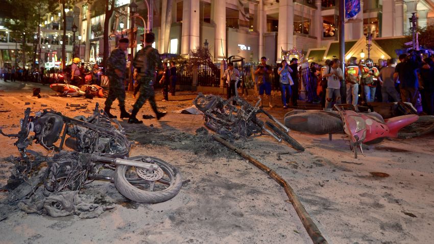Thai soldiers inspect the scene after a bomb exploded outside a religious shrine in central Bangkok late on August 17, 2015 killing at least 10 people and wounding scores more.