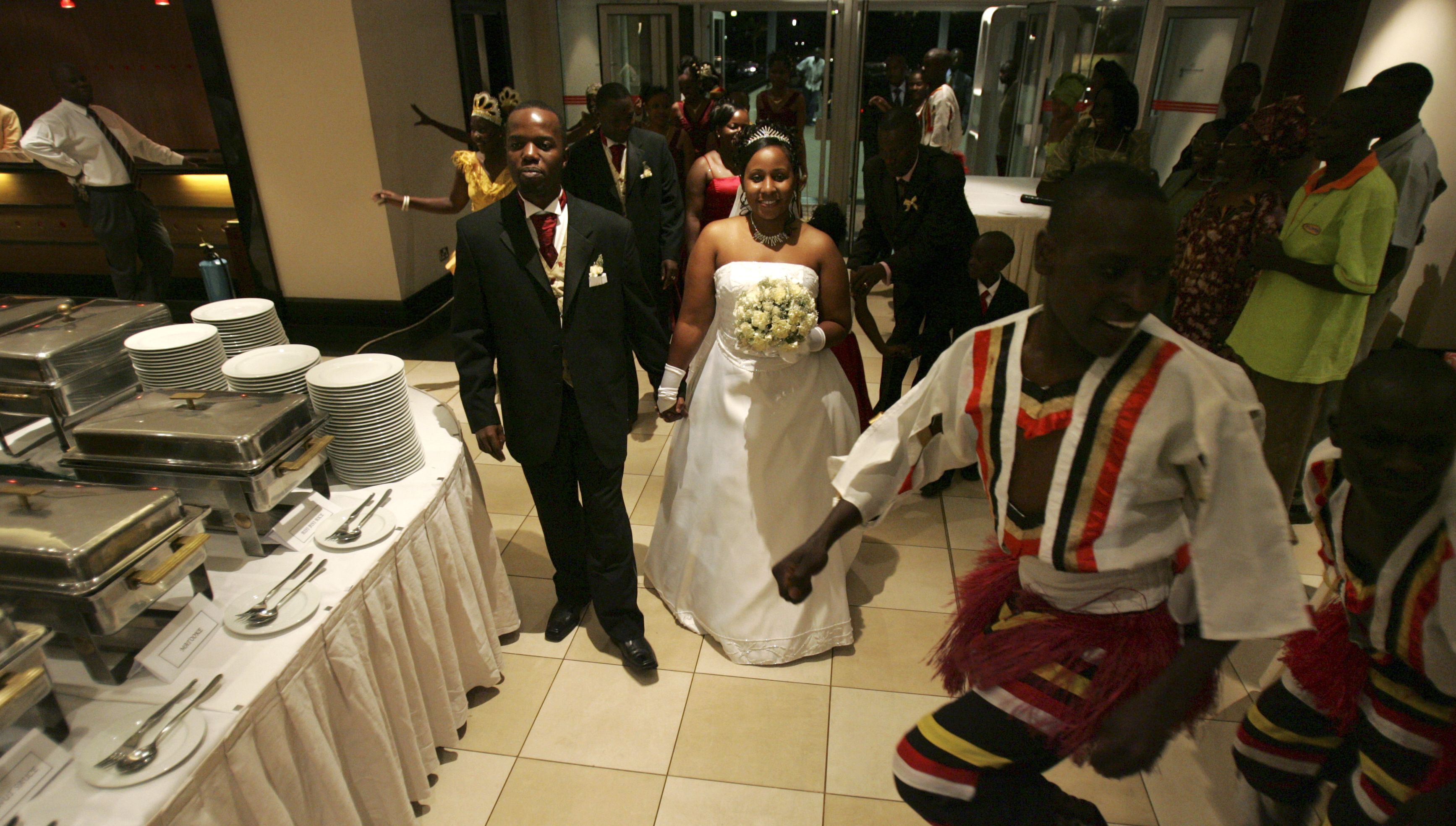 A young couple getting married in Kampala.