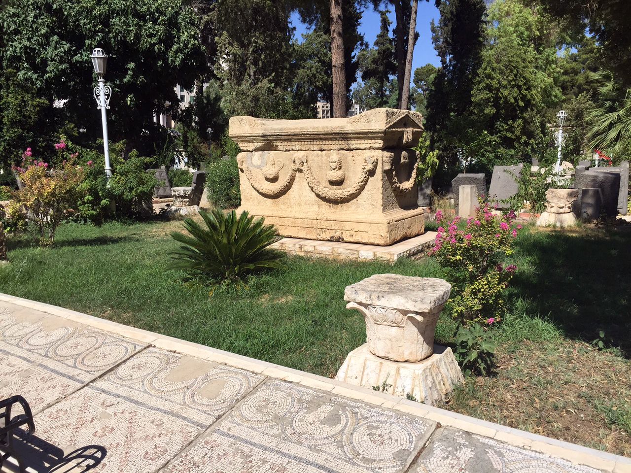 Not all of the sarcophagi have been covered in concrete yet, and the garden has been hit several times by mortar rounds in recent years.