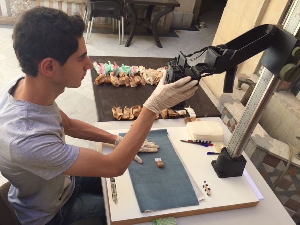 The team evacuated 35,000 artifacts from Deir Ezzor alone. Each one is photographed and given a catalog number.