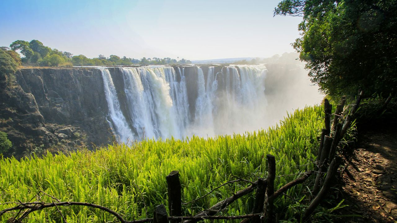 Known to locals as "Mosi-oa-Tunya" ("The Smoke that Thunders") the spray from Victoria Falls can be seen rising high above the deep Batoka Gorge from kilometers away. 