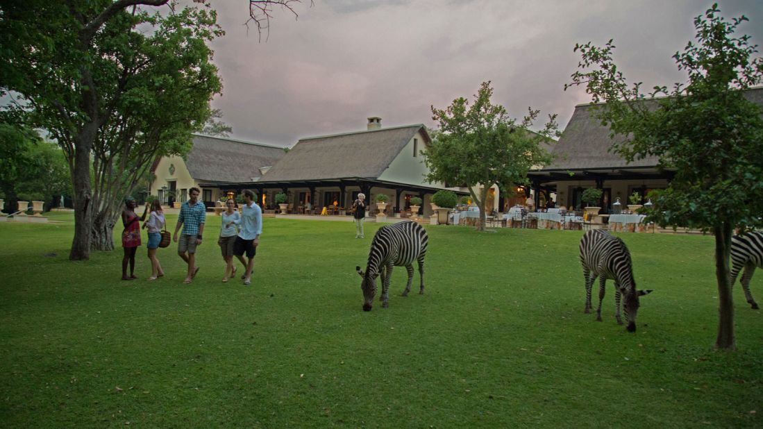 At the decadent colonial-themed Royal Livingstone hotel on the banks of the Zambezi, visitors can enjoy a stiff drink while watching zebra and giraffe graze on the manicured lawns. 