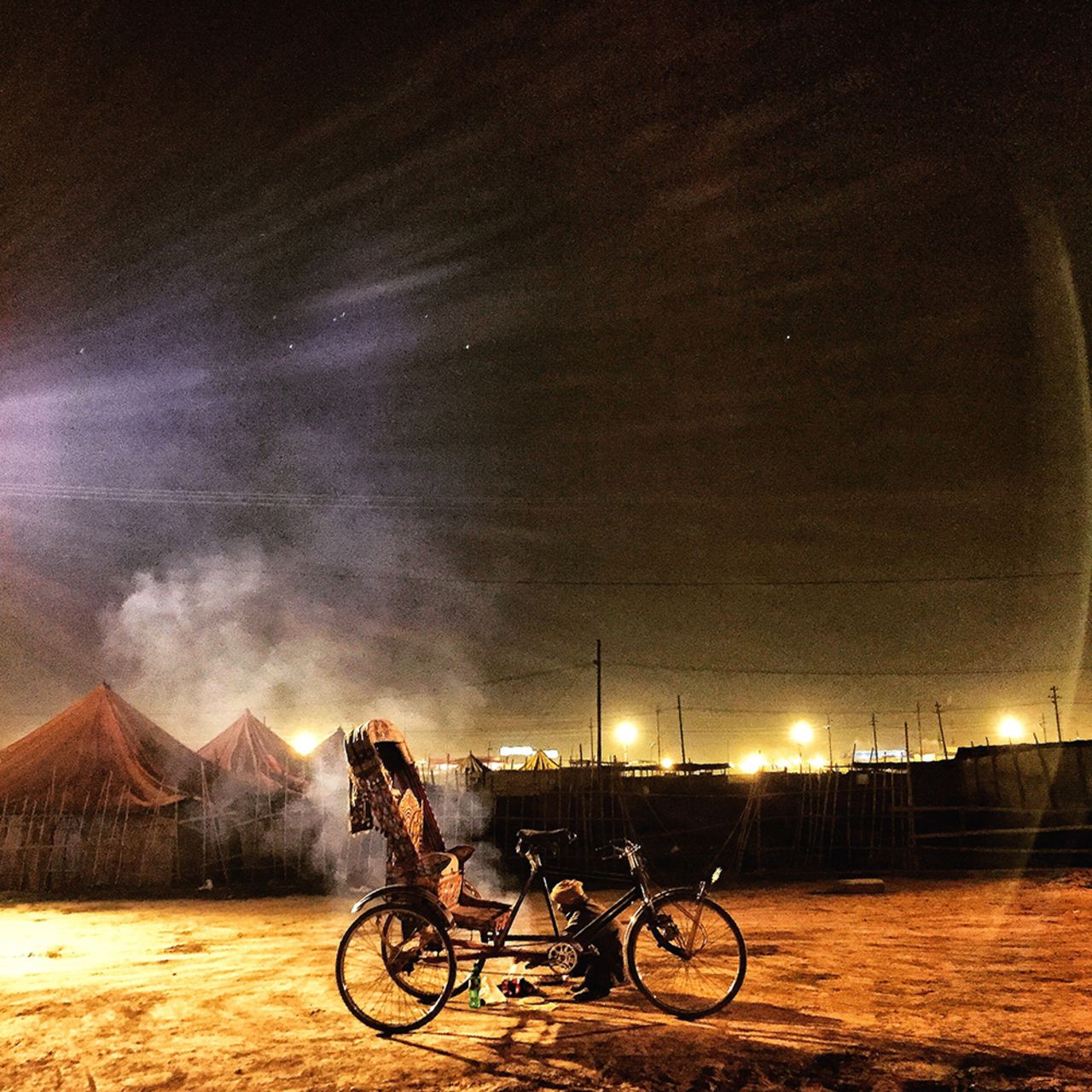 <a href="https://instagram.com/khannachandan/" target="_blank" target="_blank">Chandan Khanna</a> is a professional photojournalist who enjoys the immediacy of using an iPhone and Instagram to share his photography. <br />"Technological advancements have made photography accessible to everyone who owns a camera phone. I prefer that my photos look sharp and well exposed; and now with the amazing filters in digital cameras, I have the freedom of post-processing my pictures on-the-go." <br /><a href="https://instagram.com/p/y7i2DKhNoR/" target="_blank" target="_blank">Pictured, </a>an Indian cycle rickshaw puller cooks dinner for himself at a roadside, in the temporary installed city of Magh Mela in #Allahabad.