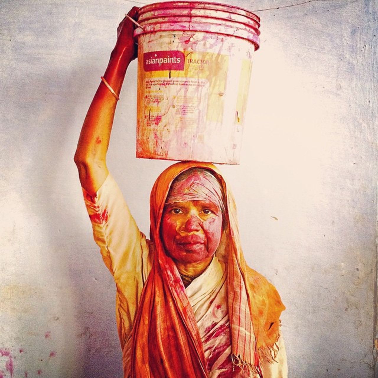 <a href="https://instagram.com/ravimishraindia/" target="_blank" target="_blank">Ravi Mishra</a> is a 25-year old fixer, producer and photographer from New Delhi. "What I like to share most is a mix of touching personal stories as well as the cultural side of India." <br /><a href="https://instagram.com/p/z7VBYSH5x2/" target="_blank" target="_blank">Pictured,</a> a Hindu widow poses with the bucket that she used to throw colored water whilst playing Holi with the other widows at their Ashram in "India's sacred city of widows", Vrindavan. <br /><br />"In some parts of Indian culture, widows are seen as the cause of their husband's death and cast out by relatives. The segregation of widows can be so extreme that in some places they are prevented from attending celebrations, abandoned by their families and left to fend for themselves."