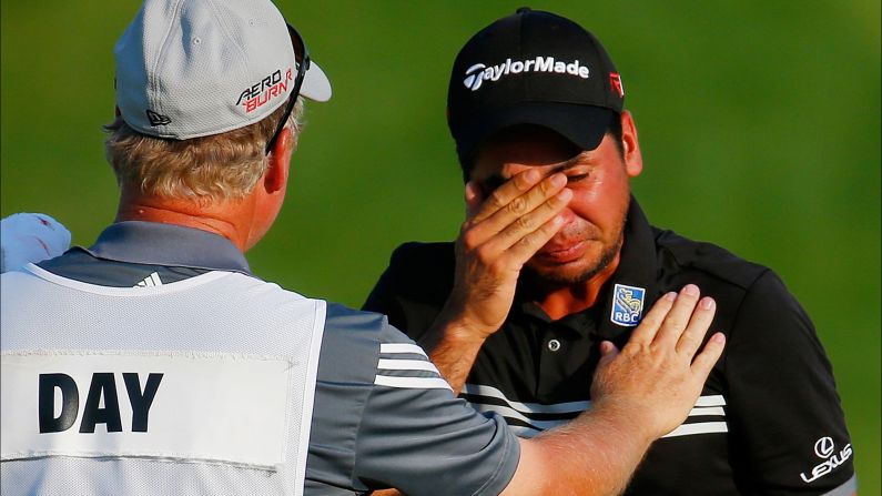 Jason Day gets emotional on the 18th green after <a href="index.php?page=&url=http%3A%2F%2Fwww.cnn.com%2F2015%2F08%2F16%2Fgolf%2Fgolf-pga-day-spieth-mcilroy%2Findex.html" target="_blank">winning the PGA Championship</a> on Sunday, August 16. The Australian won the first major of his career with a record score of 20-under par.