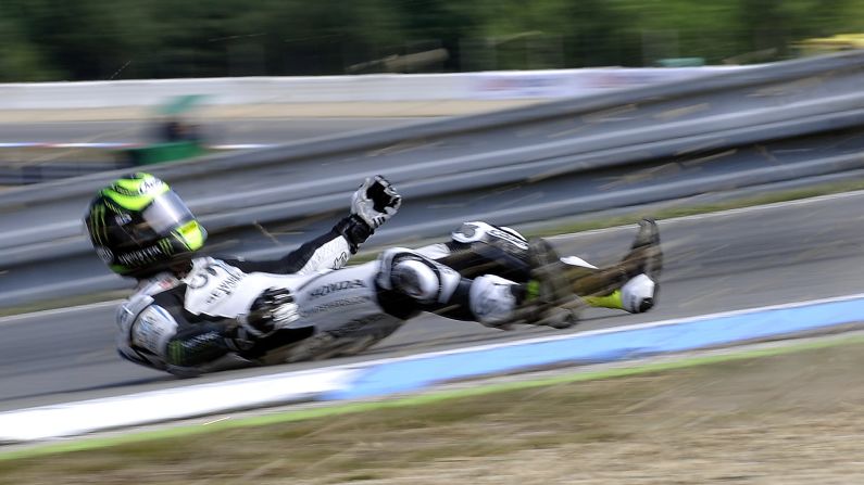 Cal Crutchlow falls off his motorcycle during the MotoGP race in Brno, Czech Republic, on Sunday, August 16. He was not seriously hurt.
