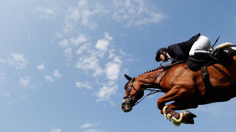 Simon Delestre, riding Chesall, competes in a show-jumping event in Valkenswaard, Netherlands, on Thursday, August 13.