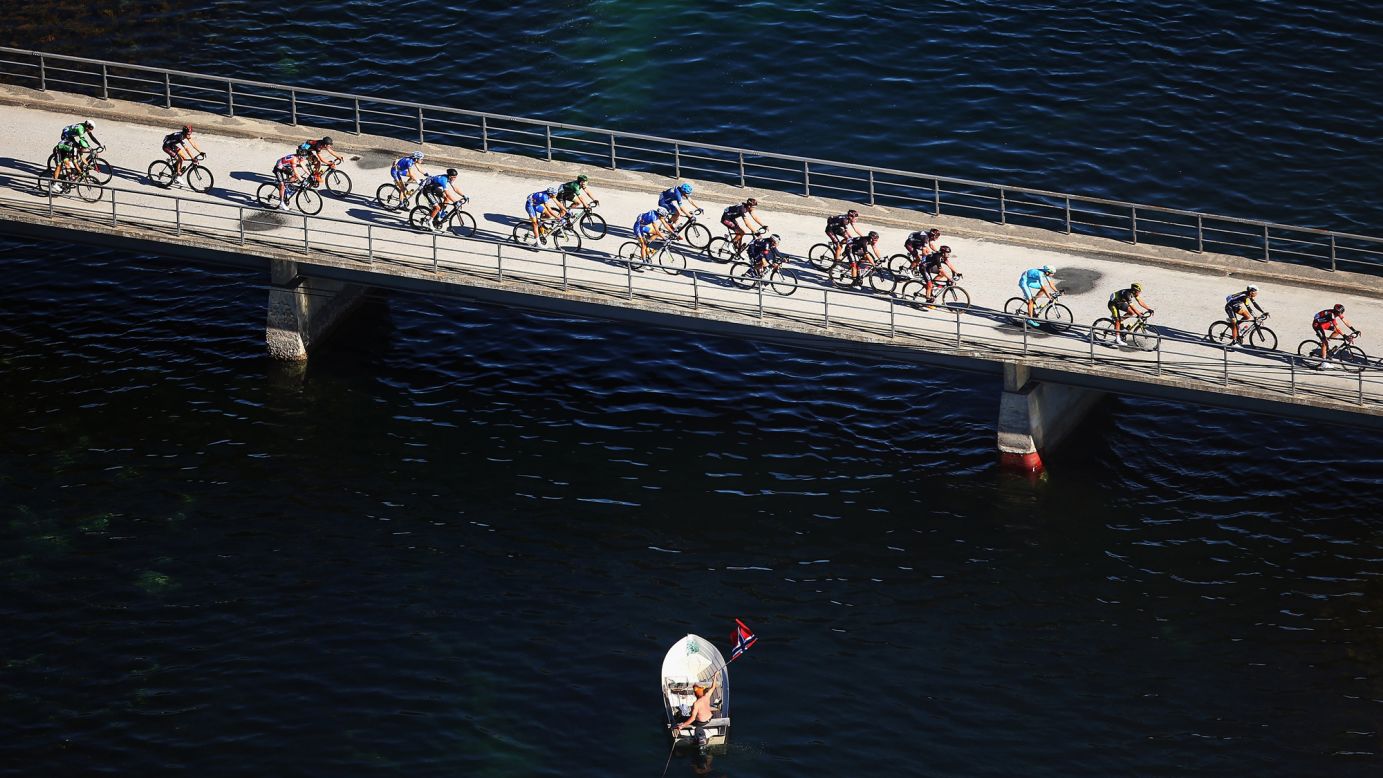 Cyclists compete in Malselv, Norway, during the third stage of the Arctic Race of Norway on Saturday, August 15.