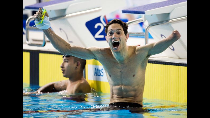 Argentina's Facundo Lazo celebrates after winning the 100-meter breaststroke Tuesday, August 11, at the Parapan American Games in Toronto.