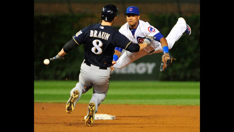 Milwaukee's Ryan Braun slides safely into second as the ball goes by Starlin Castro of the Chicago Cubs on Wednesday, August 12. <a href="index.php?page=&url=http%3A%2F%2Fwww.cnn.com%2F2015%2F08%2F11%2Fsport%2Fgallery%2Fwhat-a-shot-sports-0810%2Findex.html" target="_blank">See 26 amazing sports photos from last week</a>