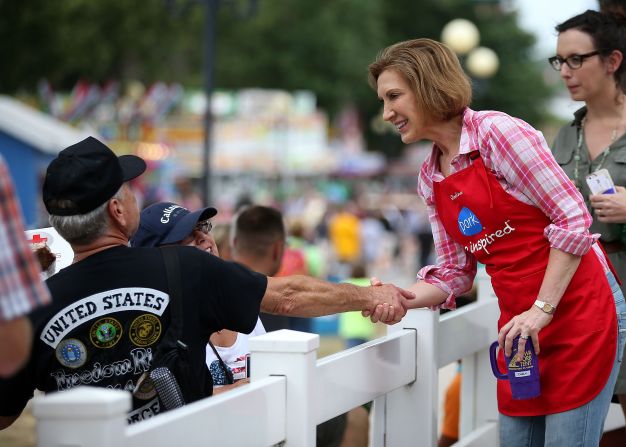 Fiorina greets fairgoers at the Iowa Pork Producers tent on August 17.