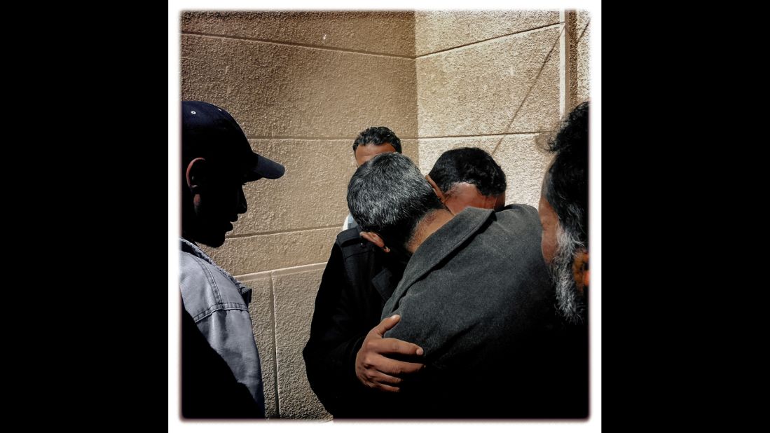 People mourn for their fallen brother outside a mosque in Ajdabiya in March 2011. The trip to Libya was Brown's first experience in armed conflict.