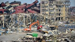 TIANJIN, CHINA - AUGUST 17: (CHINA OUT) Rescuers work at the blast site during the aftermath of the warehouse explosion on August 17, 2015 in Tianjin, China. The death toll has risen to 114 following last Wednesday night's explosion at a warehouse in the Binhai New Area of Tianjin. (Photo by ChinaFotoPress/Getty Images)